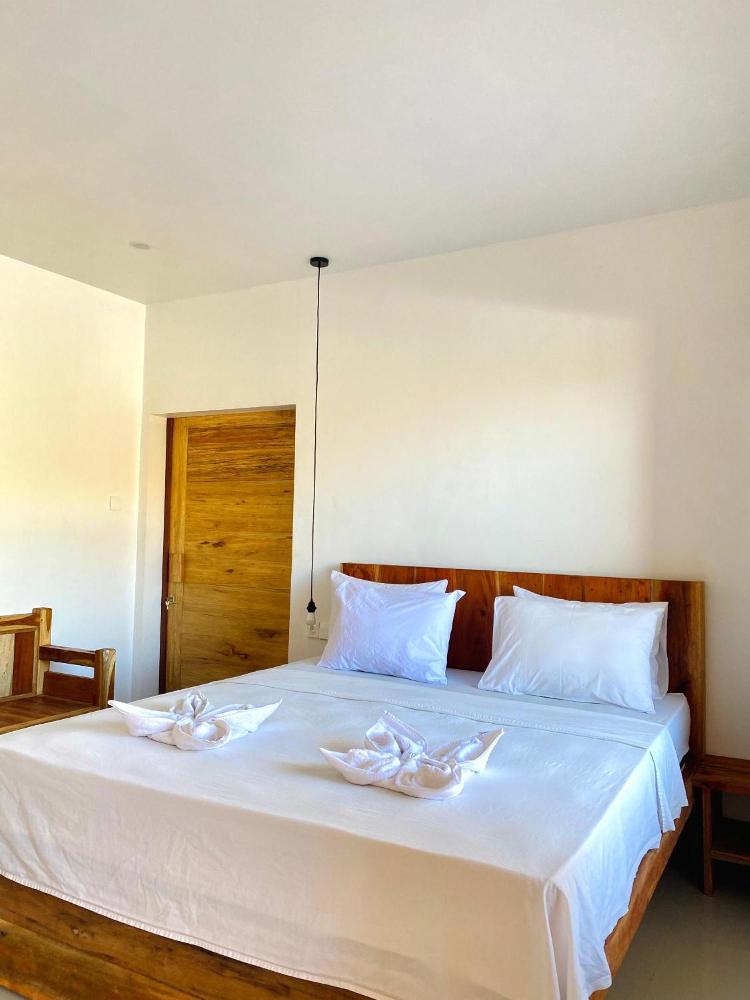 Hotel Sky Mountain Views à Kuta  Extérieur photo