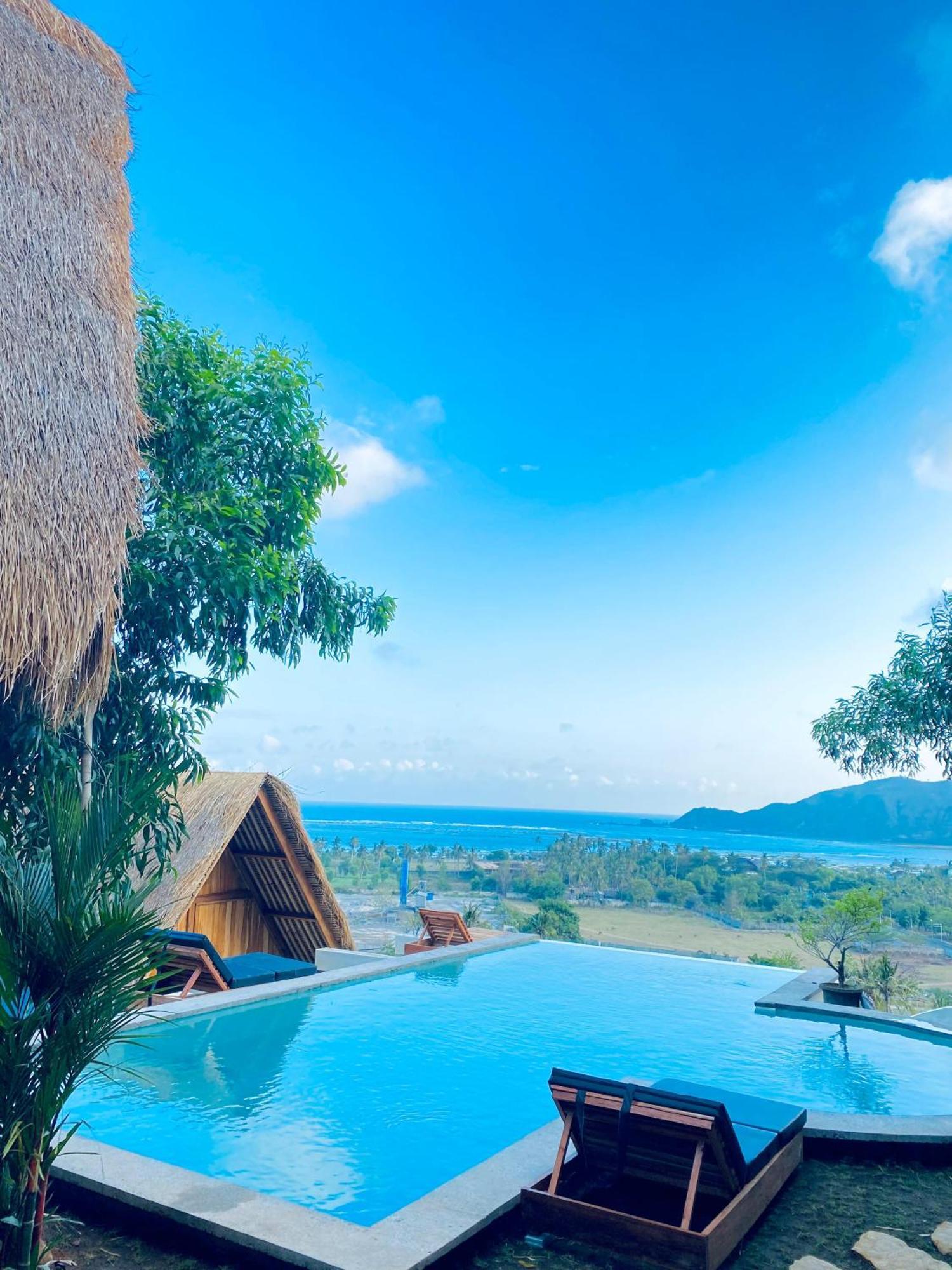Hotel Sky Mountain Views à Kuta  Extérieur photo