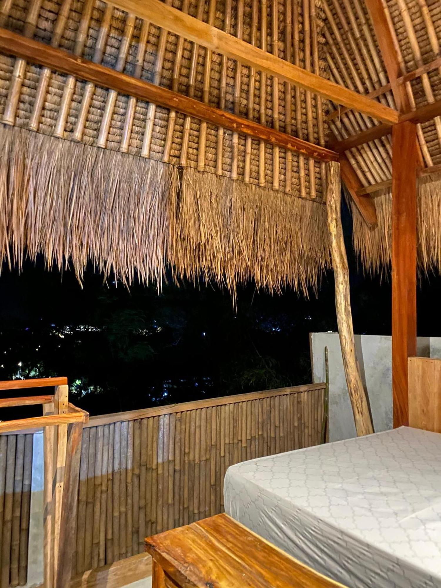 Hotel Sky Mountain Views à Kuta  Extérieur photo